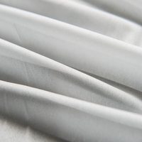 Tissu d'entoilage jet d'eau certifié OEKO TEX avec point de colle noir pour les marques de mode écologiques