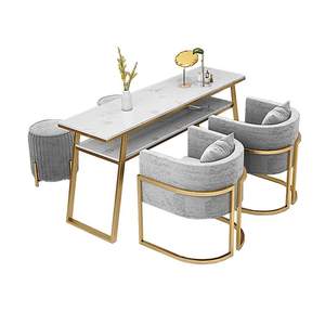 Table de manucure et pédicure avec plateau en marbre blanc, pieds en métal doré, étagère de rangement et fauteuils confortables en velours - Product Image 4