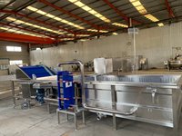 Pasteurisateur à bande transporteuse continu de type tunnel pour la pasteurisation alimentaire, ligne de traitement complète