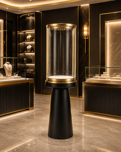 Diseño de Joyería de Lujo, Vitrina Cilíndrica de Vidrio Personalizada, Solución Interior Llave en Mano en Acero Inoxidable Negro y Dorado - Product Image 1