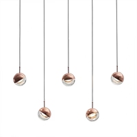 Lustre long de luxe de boule de globe d'or rose de la lumière pendante LED de vente en gros d'usine nordique rétro pour la lampe LED de petite taille d'escalier