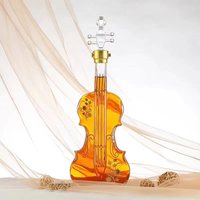 Processus de verre en forme de violon joint épaissi bouteille de médicament en mousse de guitare bouteille créative en forme de bouteille vide