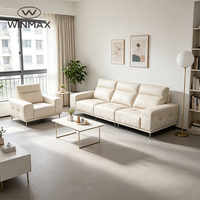 Canapé-lit modulaire 3 places en cuir capitonné de luxe moderne, avec cadre en bois et fer, dossier coussiné et accoudoirs droits, pour salons