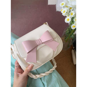 Sac rond mignon avec nœud papillon, couleur blanc cassé, boucle magnétique, bandoulière simple, style féminin, usage quotidien - Product Image 4
