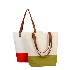 Bolsa de Playa de Lona Portátil con Asa de PU y Diseño de Empalme - Product Image 1