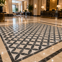 Marbre noir personnalisé avec base beige, incrustations de marbre en jet d'eau, design de marbre pour le revêtement de sol du hall d'hôtel