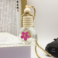 Bouteille vide ronde en verre pour diffuseur d'huiles essentielles à suspendre dans la voiture, avec décoration florale, pendentif désodorisant pour voiture, vente en gros
