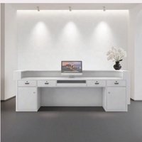 Comptoir de réception moderne minimaliste de luxe léger en forme d'arc pour salon de beauté, magasin de vêtements, bar
