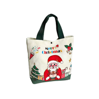 Articles cadeaux de Noël en toile réutilisables en gros avec personnalisation de logo par lots. Sac fourre-tout tendance pour les fêtes