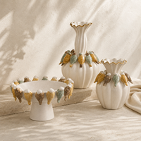 Vase à fleurs en céramique 3D en forme d'oiseau, inspiré de la nature, avec bord doré, pour décoration de table, console ou intérieur.