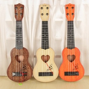 <span class=keywords><strong>Guitare</strong></span> Ukulélé <span class=keywords><strong>Jouet</strong></span> <span class=keywords><strong>en</strong></span> Plastique Imitation <span class=keywords><strong>Bois</strong></span> Vente <span class=keywords><strong>en</strong></span> Gros Style Tendance et Économique pour Enfants Débutants Fabriqué <span class=keywords><strong>en</strong></span> Chine - Product Image 2
