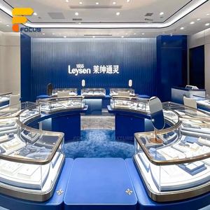 Aménagement de boutique de bijoux de luxe haut de gamme : <span class=keywords><strong>Vitrine</strong></span> en verre bleu avec cadre métallique et comptoir de présentation - Product Image 1