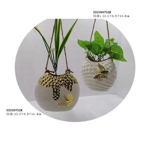 <span class=keywords><strong>Vase</strong></span> à fleurs en céramique en forme d'oeuf à motif papillon à <span class=keywords><strong>accrocher</strong></span> <span class=keywords><strong>au</strong></span> <span class=keywords><strong>mur</strong></span> pour la décoration intérieure - Product Image 1