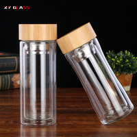 Botol air teh longgar, tutup bambu kaca tahan panas dinding ganda bentuk baru