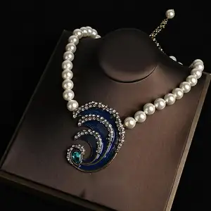 Conjunto de collar de pendientes en forma de onda azul innovador Conjunto de joyería retro elegante