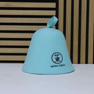 Un genial gorro de sauna de lana merino color verde azulado <span class=keywords><strong>que</strong></span> transmite el espíritu de Tokio mientras el vapor se agacha ante él. - Product Image 4