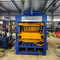 Machine à fabriquer des blocs de béton QT4-15B pour la production de blocs creux et de pavés emboîtables
