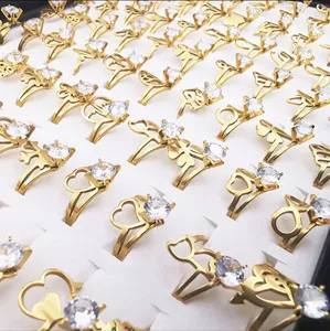 wholesale cheap price 100 pcs/lot gold plated stainless steel hollow out flower shaped geometric women's zirconia rings for girl