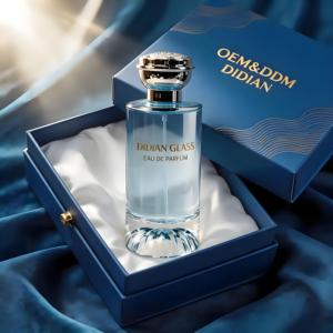 Nouveau produit, flacon <span class=keywords><strong>de</strong></span> <span class=keywords><strong>parfum</strong></span> en verre bleu <span class=keywords><strong>de</strong></span> 30 ml, 50 ml, 100 ml, emballage <span class=keywords><strong>de</strong></span> luxe transparent, flacon <span class=keywords><strong>de</strong></span> Cologne avec logo et boîte dorés - Product Image 1