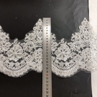Bordure de robe de mariée brodée ivoire en dentelle filet avec sequins LT2580B