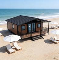Maison de conteneur en acier préfabriquée de luxe extensible avec terrasse couverte, design moderne pour chambre, appartement, villa de vacances en bord de mer, camping