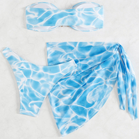 Vrouwen strapless bikini driedelige set zeesterprint decor doorschijnende mesh rok sexy strandbadkleding grensoverschrijdende groothandel