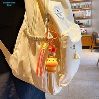 Porte-clés créatif en plastique véritable Capybara Lulu, changeant de couleur sous la lumière UV, rouge chaud, pendentif pour sac d'école, petit cadeau