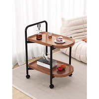 Côté canapé de salon de style nordique plusieurs chariot de petite table basse amovible moderne simple avec étagère de table à roulettes