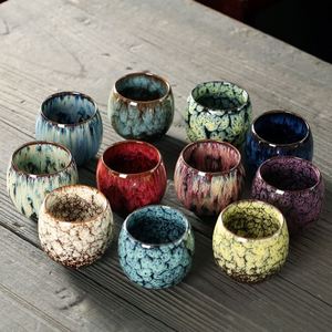 Tasse à café ou à thé en céramique colorée de forme ronde, faite à la main par un maître potier, avec logo personnalisé et effet de four changeant de couleur, style Kung Fu - Product Image 1