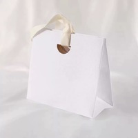 Sac cadeau de luxe en papier kraft, sac de courses en papier blanc, sac d'emballage pour vêtements, bougies et artisanat avec poignée