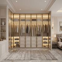Système de dressing sur mesure de style français de luxe avec portes vitrées, éclairage LED et îlot central pour chambre principale