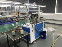 Machine de distribution bicomposant pour adhésifs AB, composés de scellement au silicone et résines époxy