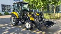 Tracteur agricole à roues haute performance avec cabine climatisée et pneus durables pour le travail de plantation et de transport agricole