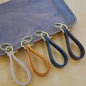 Offre Spéciale luxe véritable plume porte-clés en cuir pour hommes chanceux voiture rétro porte-clés bijoux accessoires Vintage plume porte-clés - Product Image 1