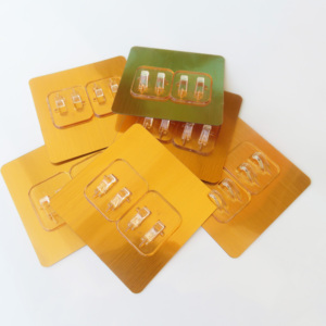 Ganci Autoadesivi in Plastica e Fibbie da Parete per Cucina e Bagno - Design Multifunzionale - Product Image 1