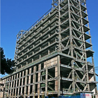 Bâtiment préfabriqué en structure acier à section H, design moderne, certifié CE/ISO9001, avec panneau anti-corrosion pour gîte