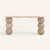 Table console murale Dream Home en pierre naturelle à plateau ondulé, avec colonne de support sphérique à niveaux, ton neutre, pour hall d'hôtel ou resort