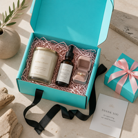 Boîte d'expédition pliante personnalisée bleu cyan en carton ondulé avec nœud en ruban satiné, matériaux recyclés, pelliculage mat, emballage plat