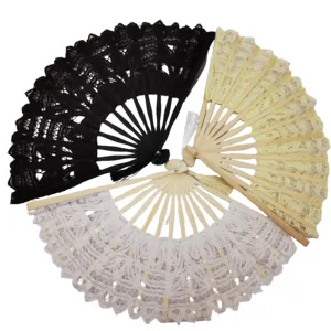 优雅的棉质蕾丝花边扇子折叠手扇子，带流苏竹子，用于婚礼舞蹈
