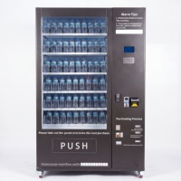 Distributeur automatique commercial en libre-service pour la vente de snacks, boissons et aliments à température ambiante dans les espaces publics