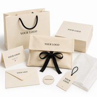 Pochette en toile anti-poussière avec nœud en ruban de coton, pochette à bijoux, emballage cadeau personnalisé avec logo imprimé, vente en gros, rangement d'accessoires