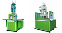 Machine de moulage par injection hydraulique verticale automatique pour plastique, avec table coulissante de bureau, pour la fabrication de fiches HDMI électriques en ABS