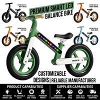 TRYCO CHASER Vélo d'équilibre avec lumières LED colorées activées par le mouvement, cadre en nylon de 12 pouces, pneu tout-terrain à vitesse unique, capacité de charge de 70 kg