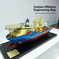 Modèle de navire de soutien offshore personnalisé avec coque bleue, superstructure jaune, fond rouge et pont de grue