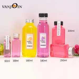 زجاجة صغيرة مربعة الشكل متوفرة بسعة 2 أونصة 60 مل ومزودة بغطاء بلاستيكي ملولب للمشروبات والعصائر والمشروبات الباردة وتتميز بالمبيعات العالية