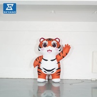 Modèle gonflable personnalisé de tigre de dessin animé, ornement gonflable en forme d'animal pour la décoration de centres commerciaux, de sites touristiques extérieurs et d'événements