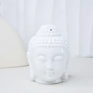 Custom Ceramic Buddha Head Aromatherapy Aroma Oil Burner Thai Buddha Head Design With Spoon Ceramic Wax Melt Warmer