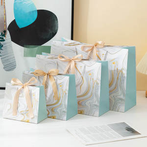Bolsas de regalo de marca de lujo personalizadas Bolsa de papel de compras de cartón blanco con impresión de logotipo para pequeñas empresas - Product Image 5