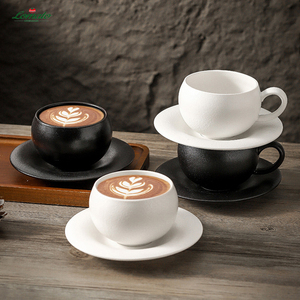 Taza <span class=keywords><strong>de</strong></span> <span class=keywords><strong>Café</strong></span> <span class=keywords><strong>de</strong></span> Cerámica Negra y Blanca Estilo Japonés <span class=keywords><strong>de</strong></span> 300 ml, Retro, Mate, con Platillo, Forma <span class=keywords><strong>de</strong></span> Huevo, para Latte, <span class=keywords><strong>Café</strong></span>, Leche, Té - Product Image 1