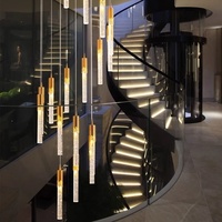 Lustre long en cristal de luxe, luminaire suspendu moderne avec tiges en verre pour villa, escalier, salon, hall d'hôtel, décoration